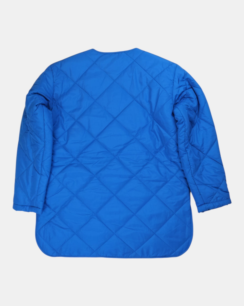 ULTIMATAGLIA.COM Giubbotto trapuntato blu elettrico con trapuntatura a rombi, collo rotondo e tasche frontali.