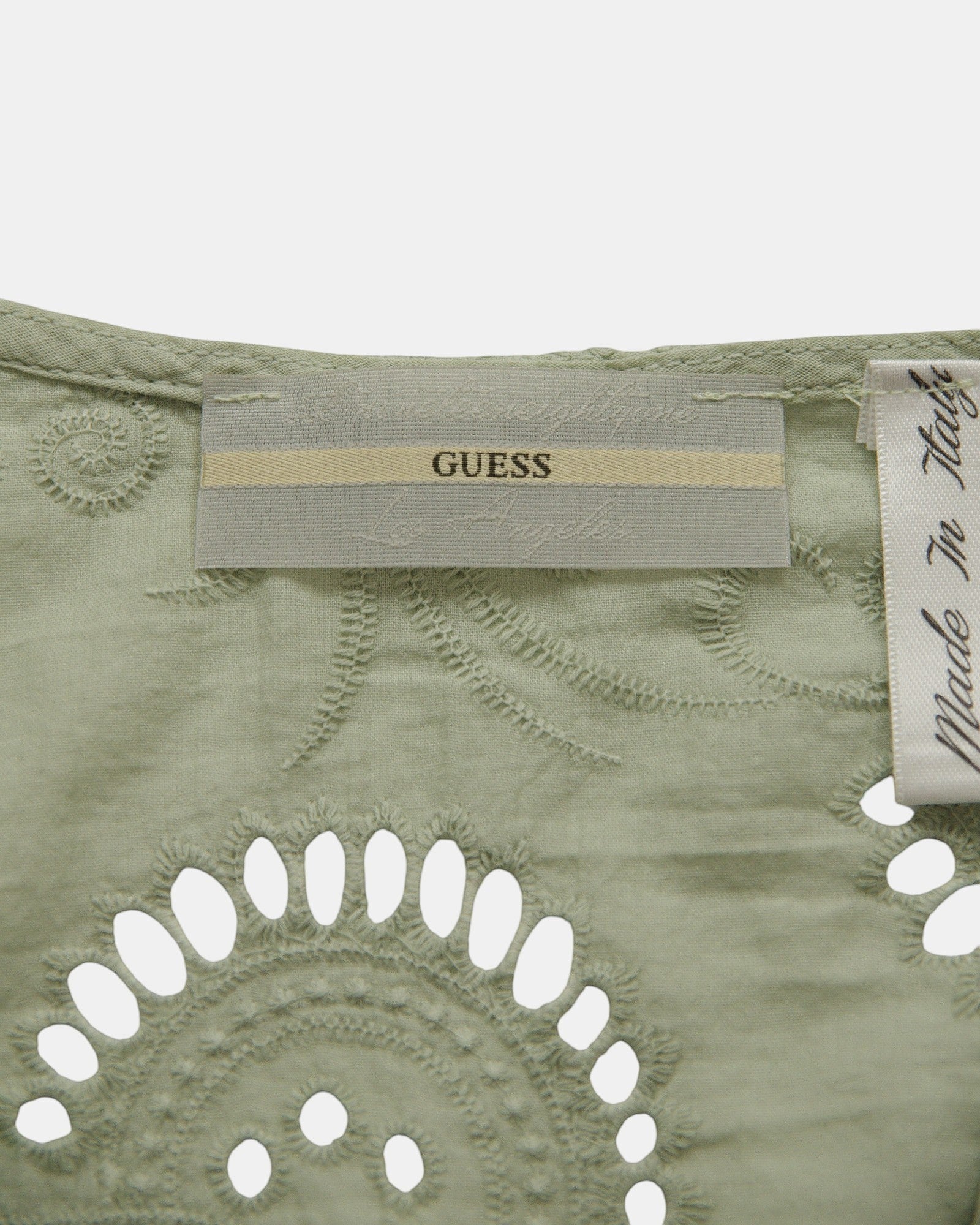 Guess short green cotton top with multicolor floral embroidery and V-neck with ties. Bohemian style.