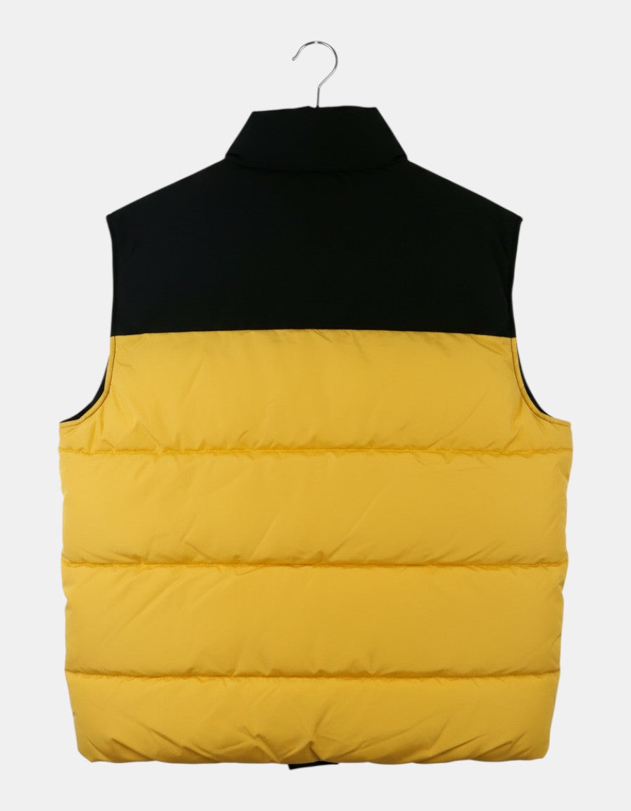 ULTIMATAGLIA.COM Gilet imbottito bicolore nero e giallo con colletto alto.