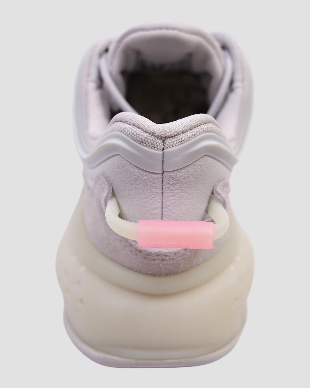 ULTIMATAGLIA.COM Sneakers Adidas Originals OZRAH J in suede grigio con dettagli rosa e suola chunky.