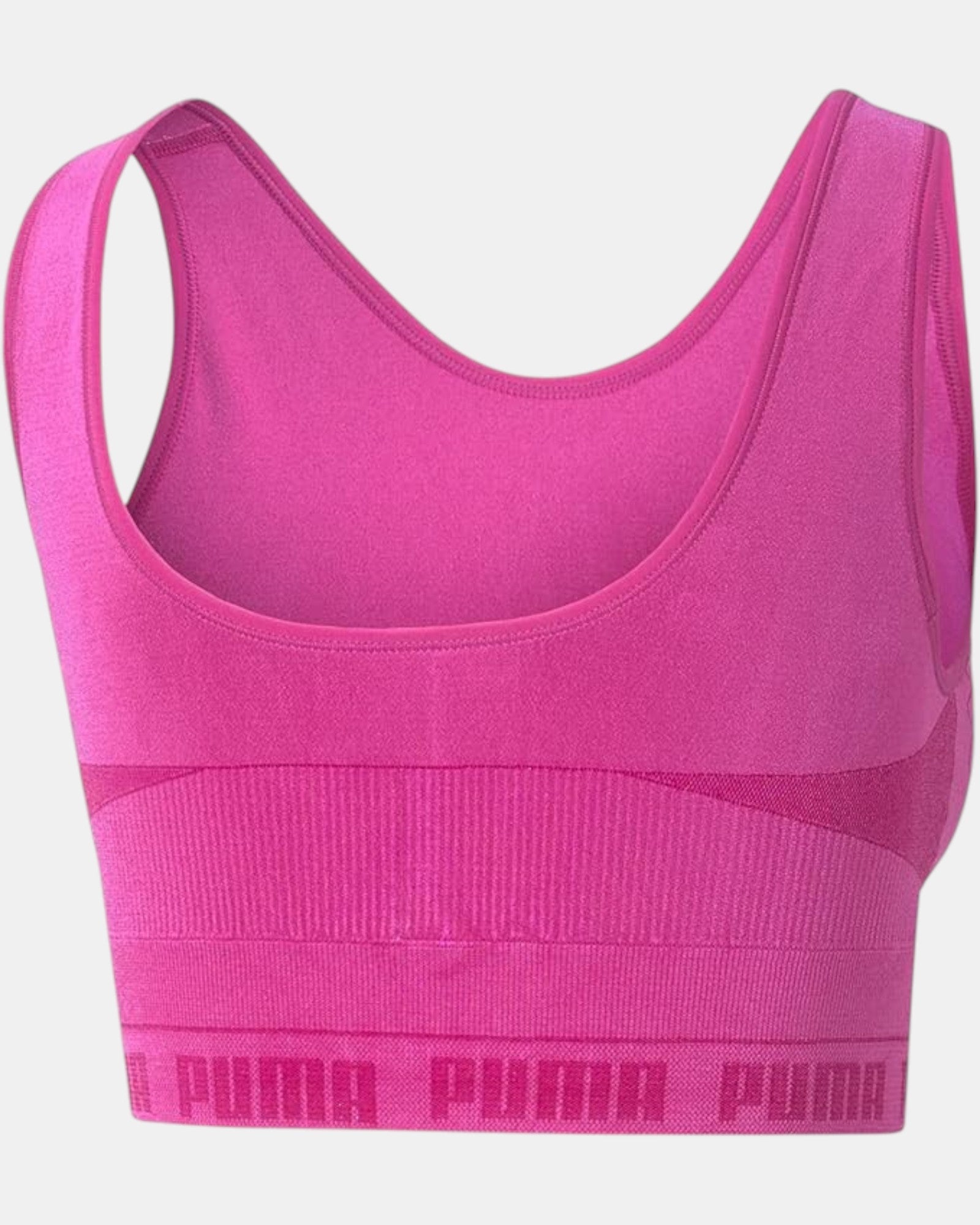 ULTIMATAGLIA.COM T-shirt crop top Puma Evoknit fucsia in tessuto seamless, logo Puma in rilievo e fascia elastica.