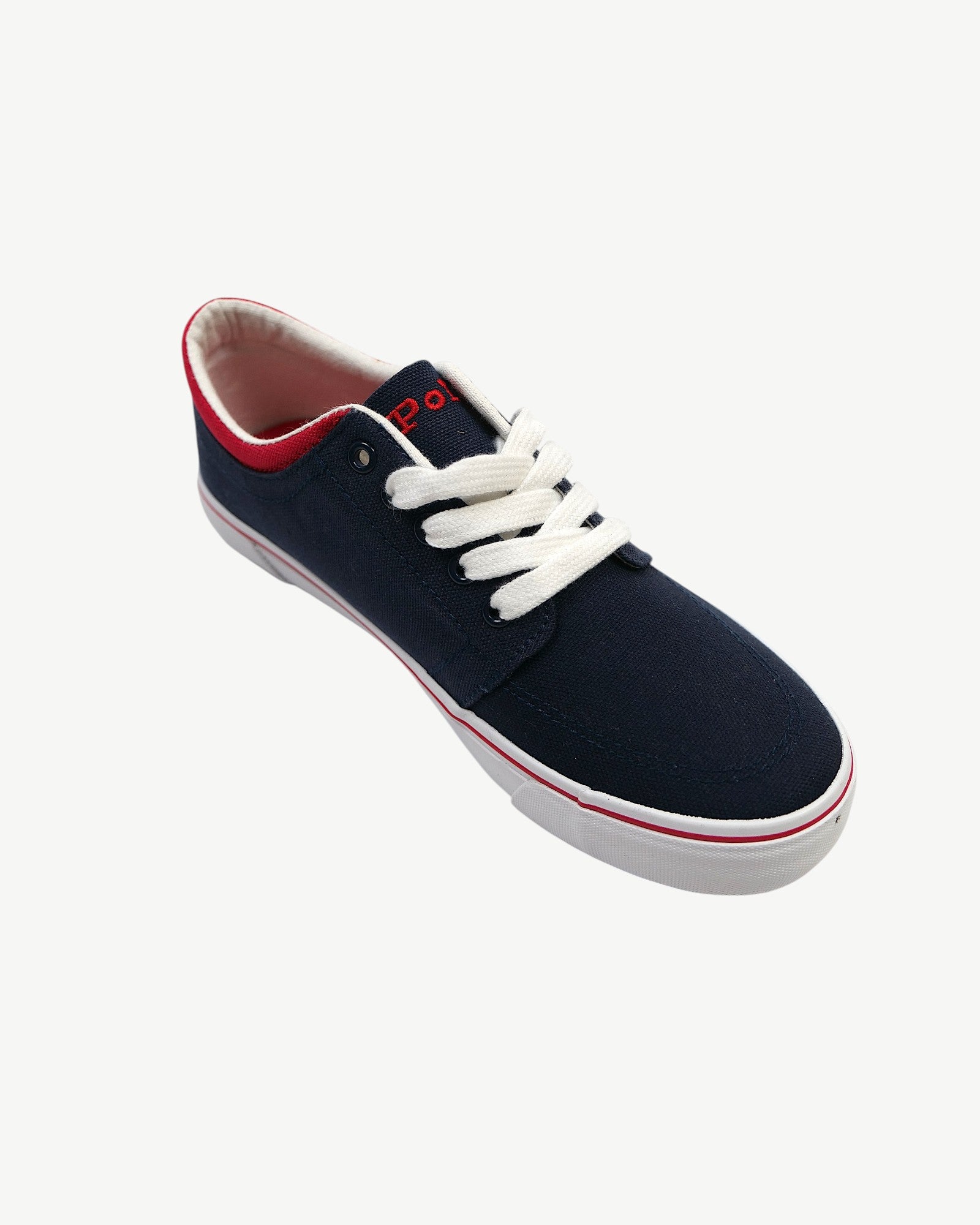 Scarpe da ginnastica blu navy in tela con lacci bianchi e dettagli rossi di Polo Ralph Lauren.