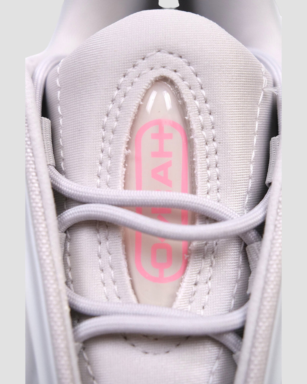 ULTIMATAGLIA.COM white mesh sneakers with pink OZRAH J logo detail and silver accents.